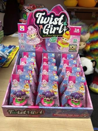 Girl spinning tops
